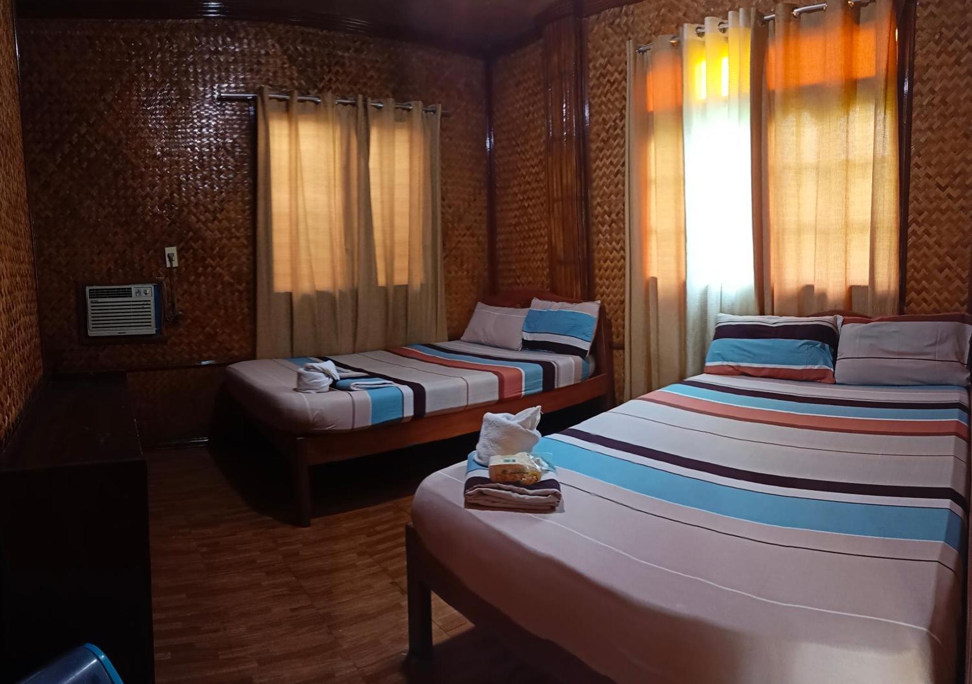 Victoria Guest House And Cottages Puerto Princesa Esterno foto